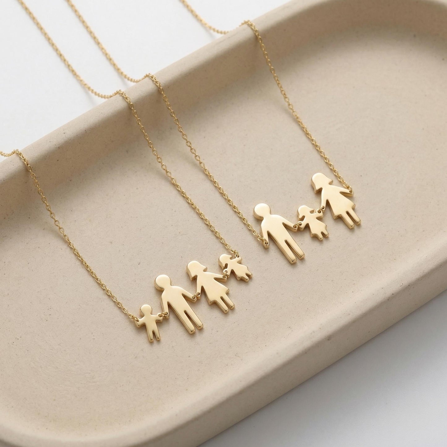 家族の絆をいつもそばに。手をつなぐシルエットのペンダント・3色展開・母の日のギフト